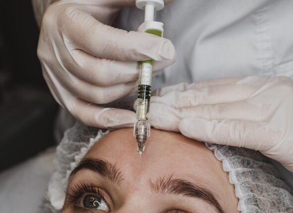 woman-getting-facial-beauty-injection-wellness-center-scaled